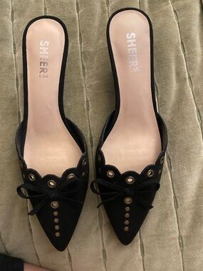 Black Pointed Slip-On Mules with Eyelet & Bow Detail